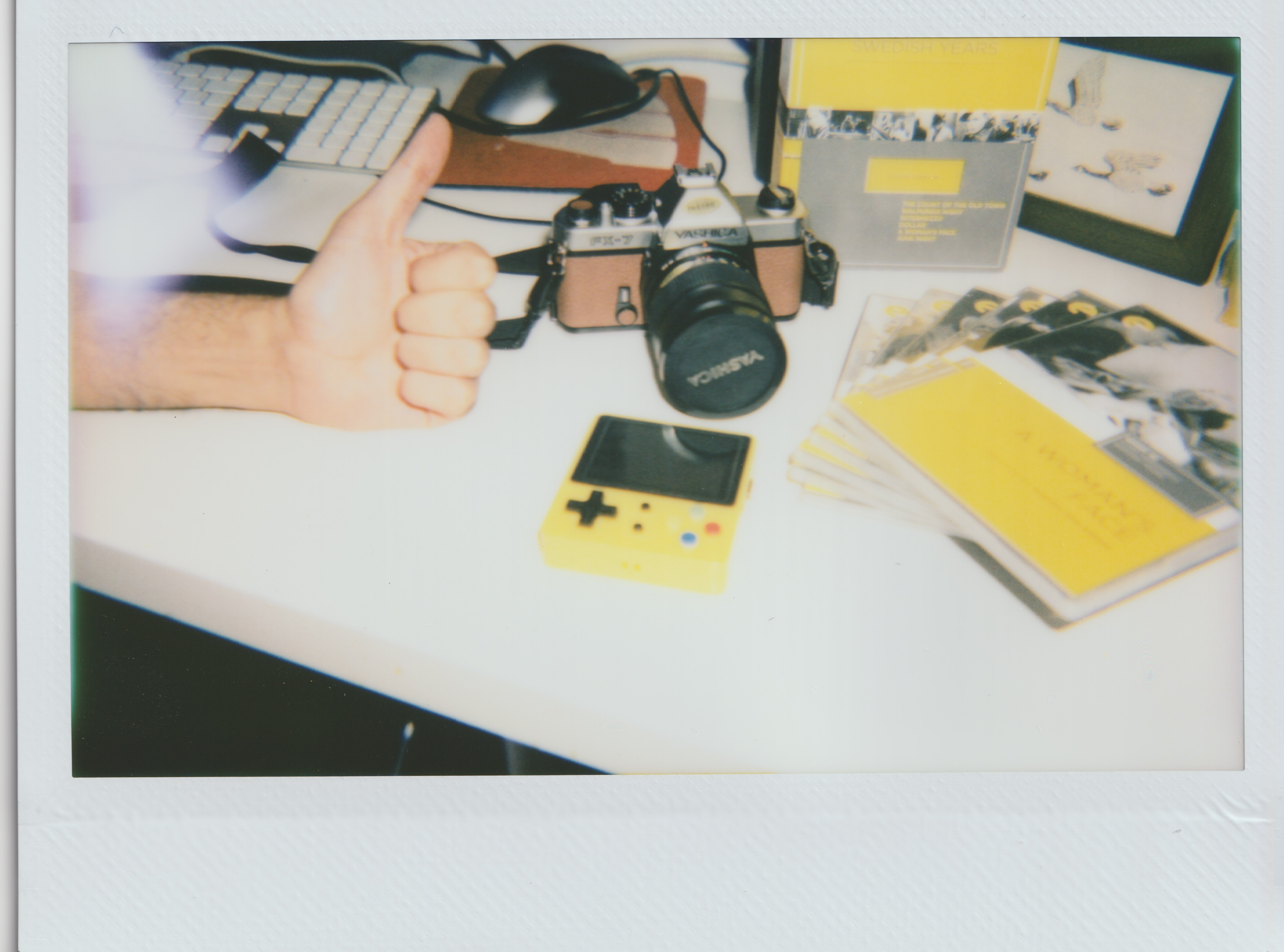 a photo of my LDK, Yashica, and Ingrid Bergman boxset